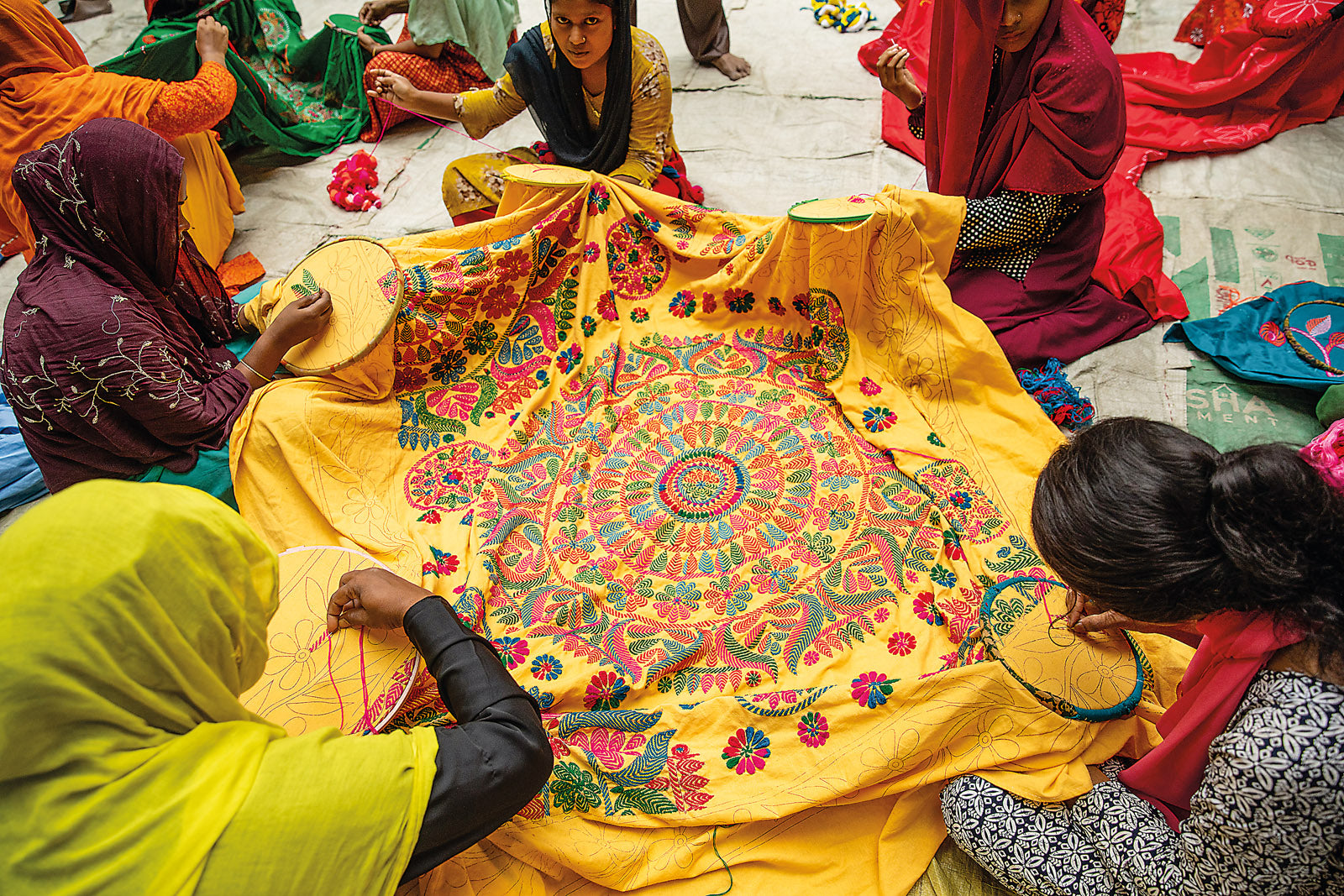Nanoor artisans making kantha stitch saree
