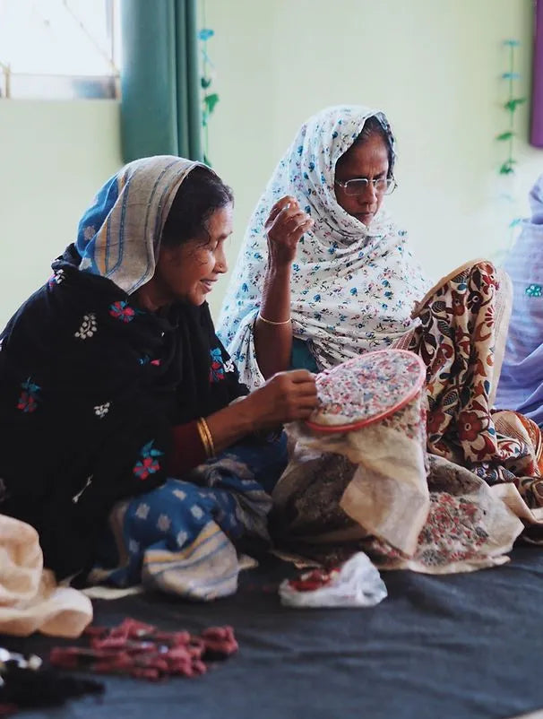 Kantha artisan hand-stitching handmade Kantha embroidery in Santiniketan, West Bengal